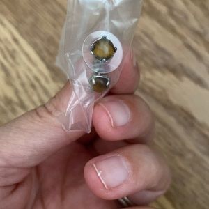 Three pairs of stud earrings